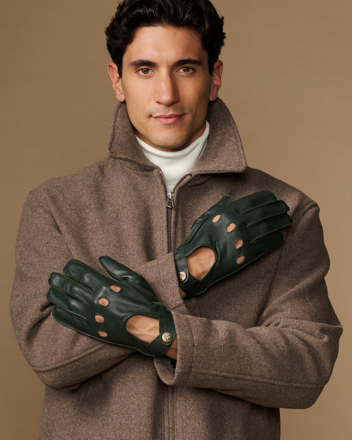 Men’s dark green lambskin driving gloves with perforated knuckles and touchscreen tips