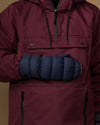 Blue padded mitten with stretchy cuff and snap-button wrist closure