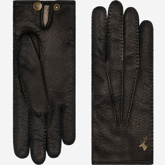 Women's black leather gloves with finger seams and gold emblem on back