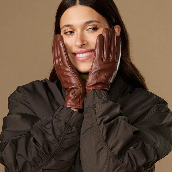 Cognac brown leather gloves with warm fleece lining, long cuffs, smooth finish