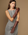 Women's brown below-elbow leather gloves with silk lining, stitched finger seams
