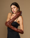 Chocolate brown leather elbow gloves with long fitted sleeves and tapered fingers