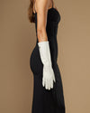 Women’s white lambskin leather below-elbow glove on arm, silk-lined