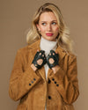 Dark green fingerless lambskin driving gloves with stitched cutouts and cuff buttons